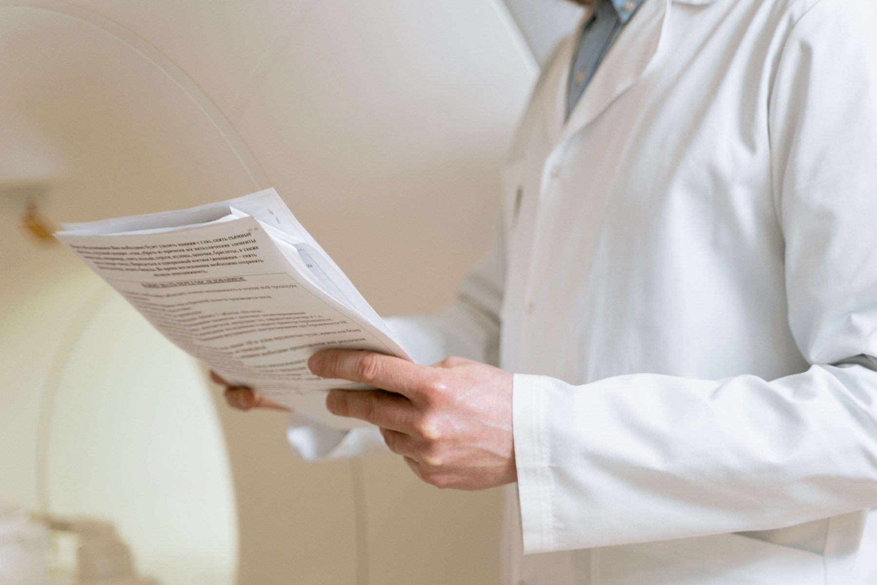 Healthcare professional carefully reviewing clinical information
